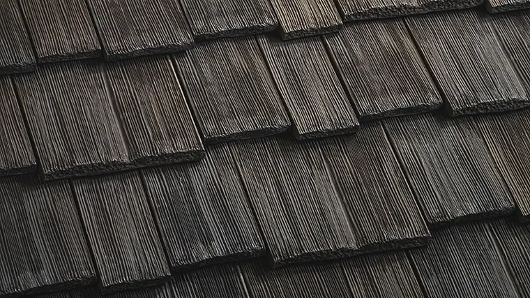 CeDUR Shiloh synthetic cedar shake in a dark weathered charcoal with silver-grey highlights